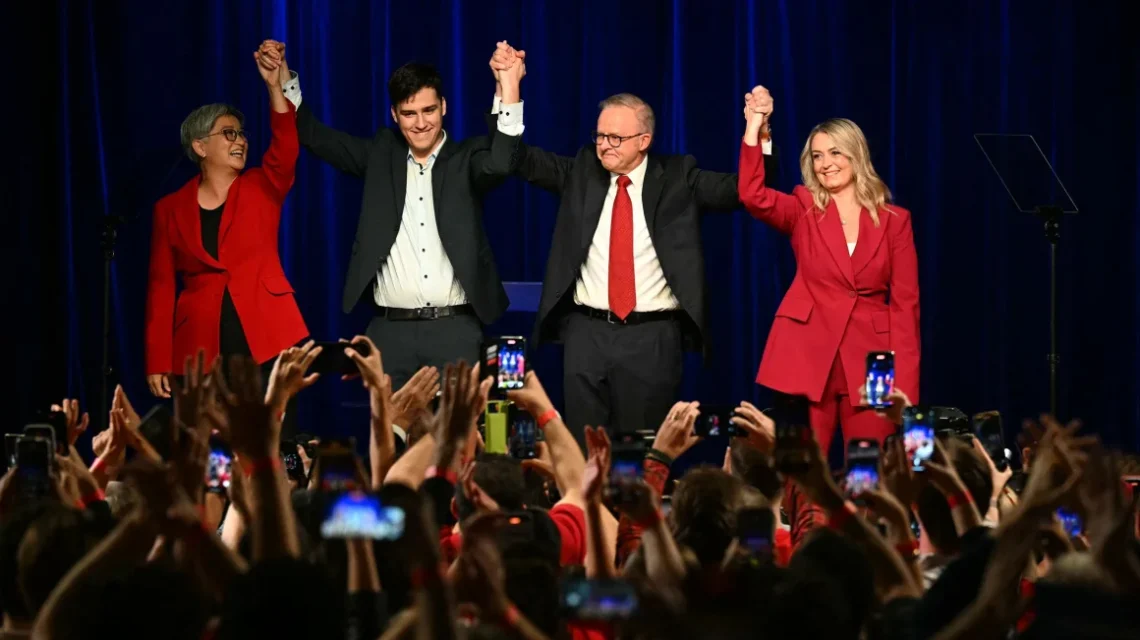 Australia's Prime Minister Anthony Albanese celebrates with his partner Jodie Haydon, son Nathan and Australia's Foreign Minister Penny Wong after winning the general election at the Labor Party election night event in Sydney on May 3. Saeed Khan/AFP/Getty Images
