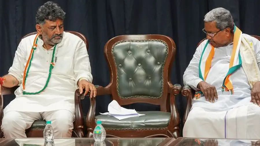 Tension Delhi continues in Karnataka Congress CM change denied as top rival heads to Delhi